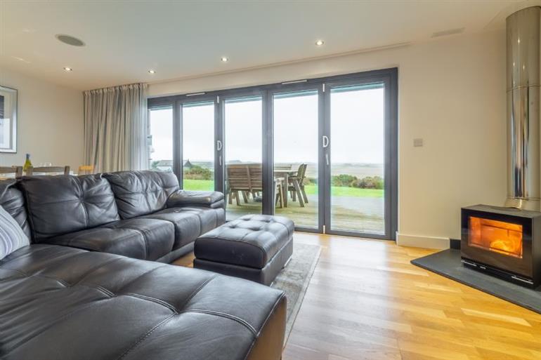Stargazy, St Agnes. Get cosy in front of a state-of-the-art wood burning stove at Stargazy,